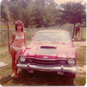 My Mom posing with her car, the Bear Cat!  She was a hottie! lol